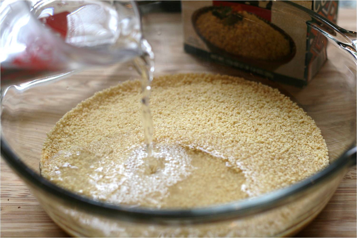 Add boiling water to couscous